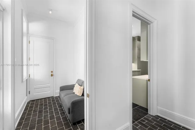 an aerial view of multiple houses with a yard