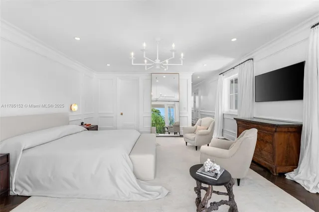 a view of a swimming pool with a patio and a yard