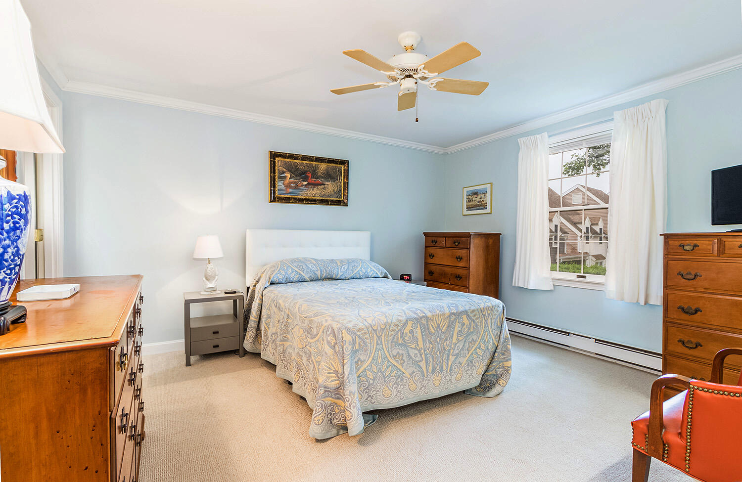 39 Tower Hill Road, Unit 4C Osterville, MA 02655 - Photo 13 of 23 a bedroom with a bed and a baby bed