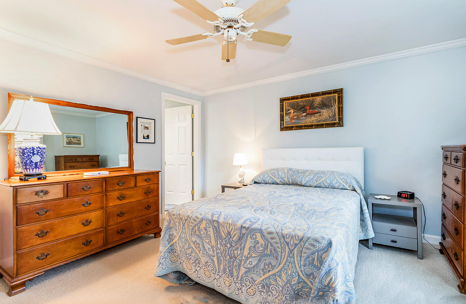 39 Tower Hill Road, Unit 4C Osterville, MA 02655 - Photo 15 of 23 a bedroom with a bed and a dresser in it