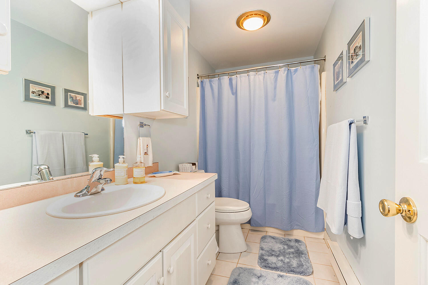 39 Tower Hill Road, Unit 4C Osterville, MA 02655 - Photo 16 of 23 a bathroom with a sink toilet and shower