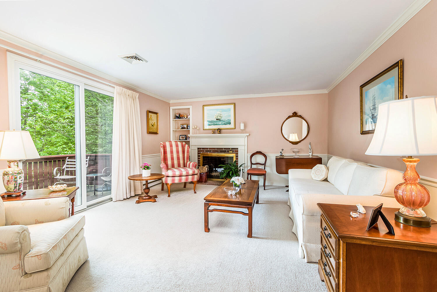 39 Tower Hill Road, Unit 4C Osterville, MA 02655 - Photo 3 of 23 a living room with furniture a fireplace and a large window