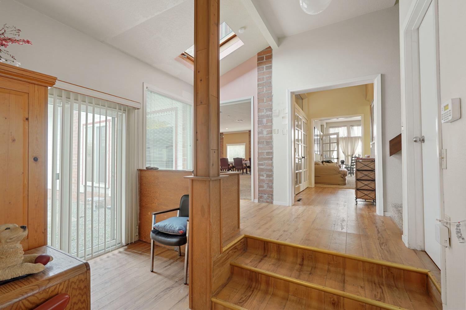 5766 Alpine Road Stockton, CA 95215 - Photo 42 of 99 a living room with furniture and wooden floor