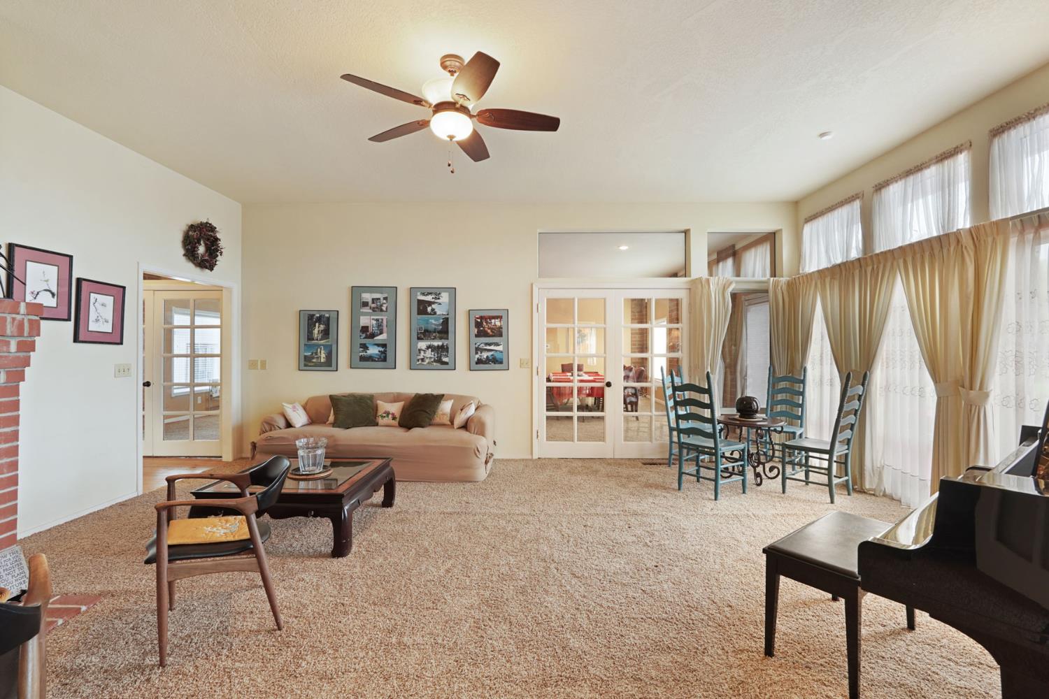 5766 Alpine Road Stockton, CA 95215 - Photo 51 of 99 a living room with furniture and a large window