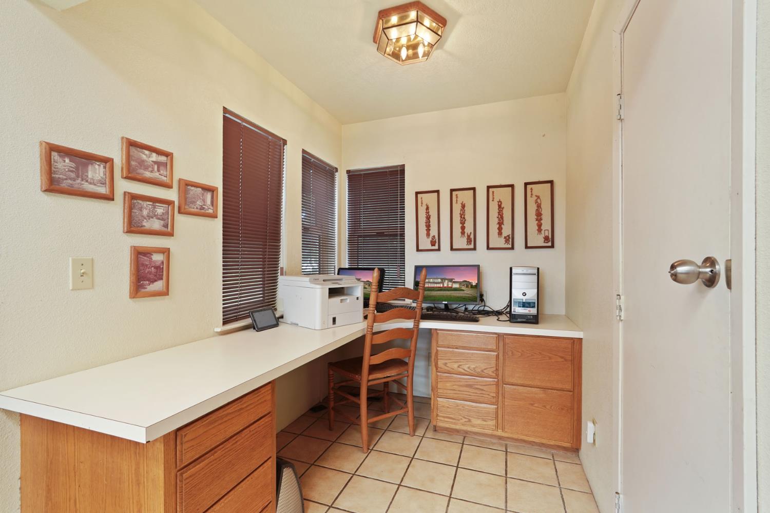 5766 Alpine Road Stockton, CA 95215 - Photo 58 of 99 a kitchen with a sink cabinets and window