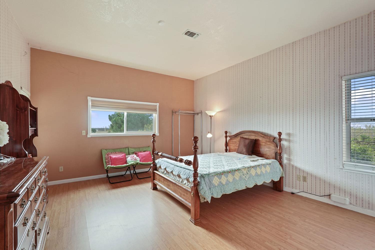 5766 Alpine Road Stockton, CA 95215 - Photo 70 of 99 a bedroom with a bed and a window