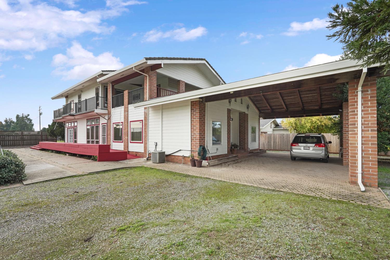 5766 Alpine Road Stockton, CA 95215 - Photo 83 of 99 a view of a house with backyard and porch