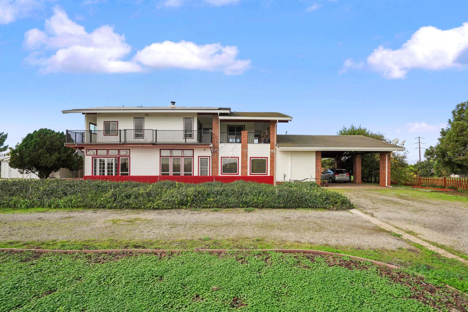 5766 Alpine Road Stockton, CA 95215 - Photo 85 of 99 a front view of a house with a yard