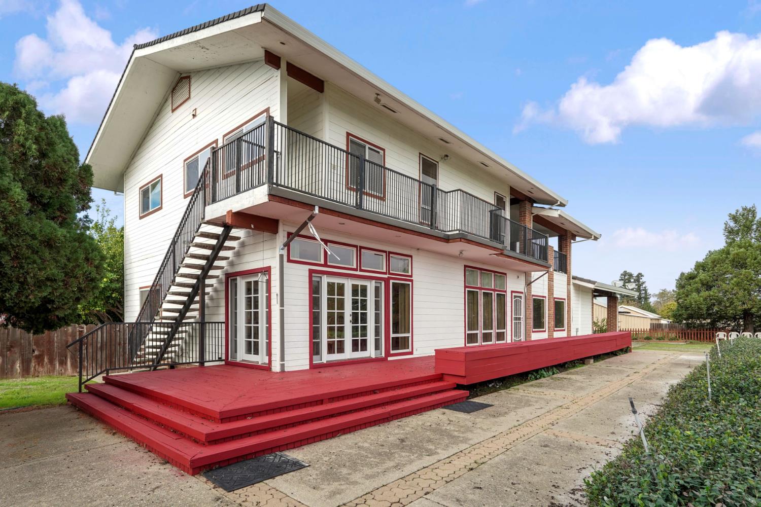 5766 Alpine Road Stockton, CA 95215 - Photo 87 of 99 a view of a building with a bench