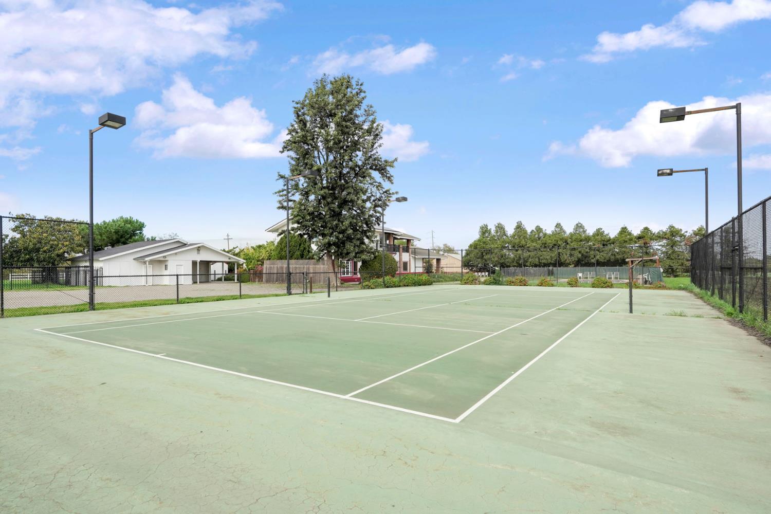 5766 Alpine Road Stockton, CA 95215 - Photo 91 of 99 a view of a tennis court