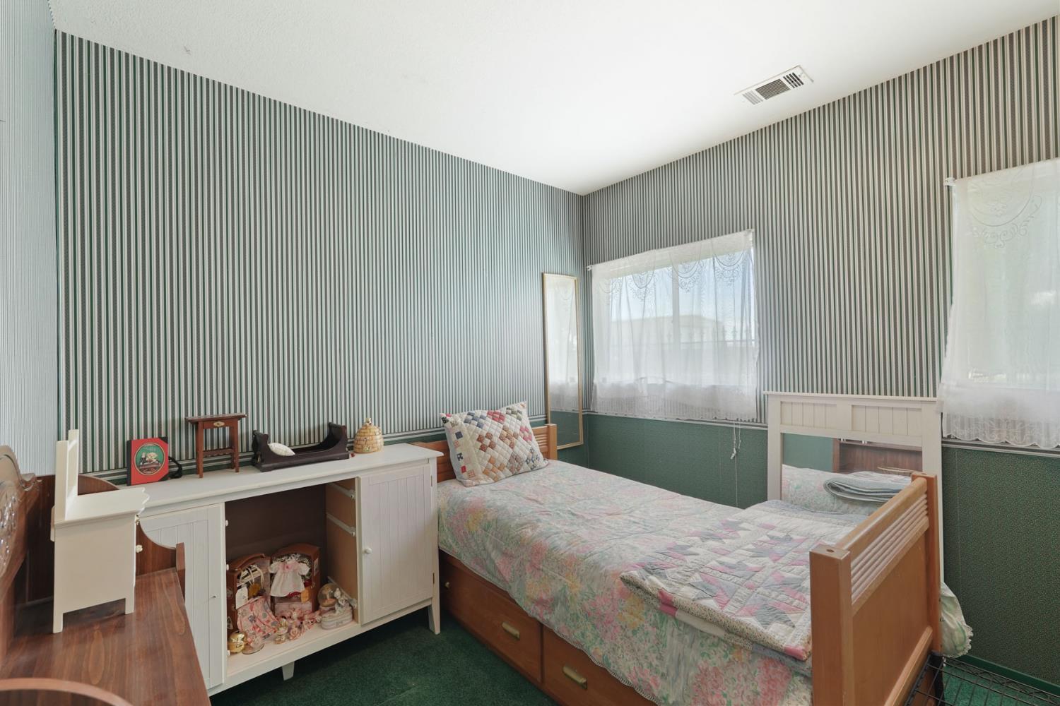 5766 Alpine Road Stockton, CA 95215 - Photo 95 of 99 a bedroom with a bed and a window