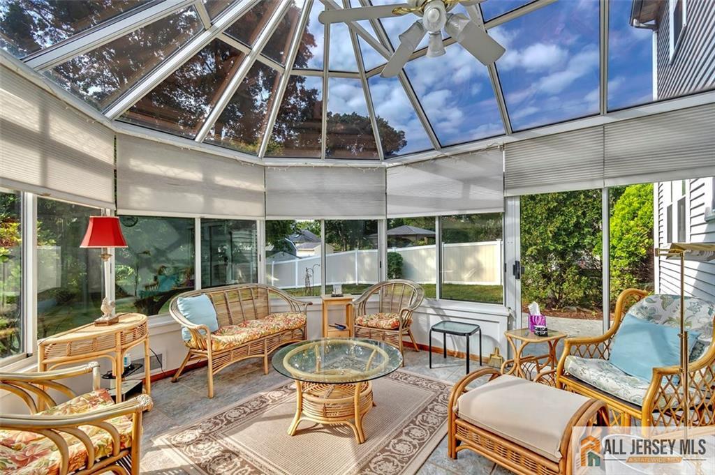 93 Remmey Street Fords, NJ 08863 - Photo 11 of 27 a building outdoor space with patio furniture and potted plants