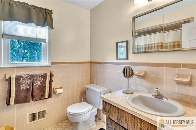 a bathroom with a sink and a toilet