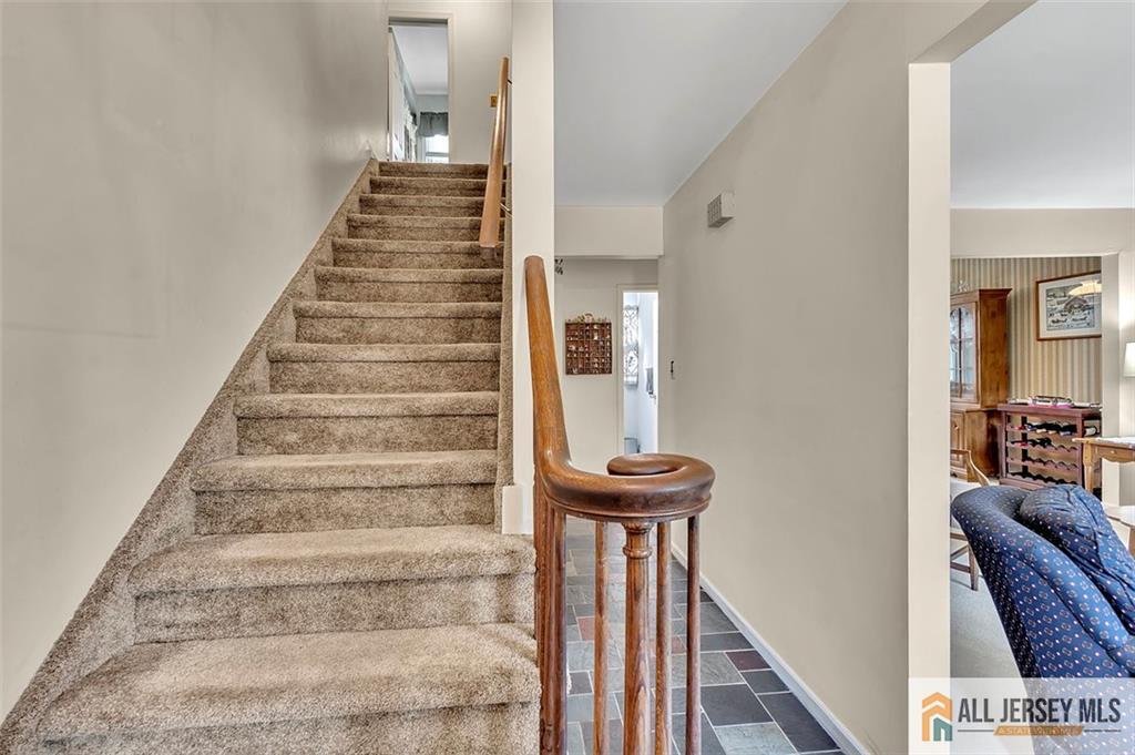 93 Remmey Street Fords, NJ 08863 - Photo 5 of 27 a view of entryway and hall with wooden floor