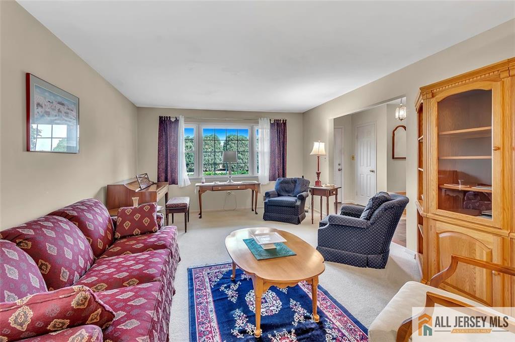 93 Remmey Street Fords, NJ 08863 - Photo 7 of 27 a living room with furniture and a window