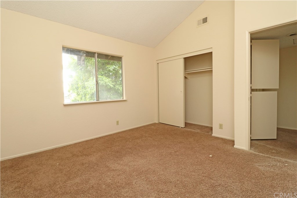 712 Earlham Drive Claremont, CA 91711 - Photo 11 of 14 an empty room with windows and closet