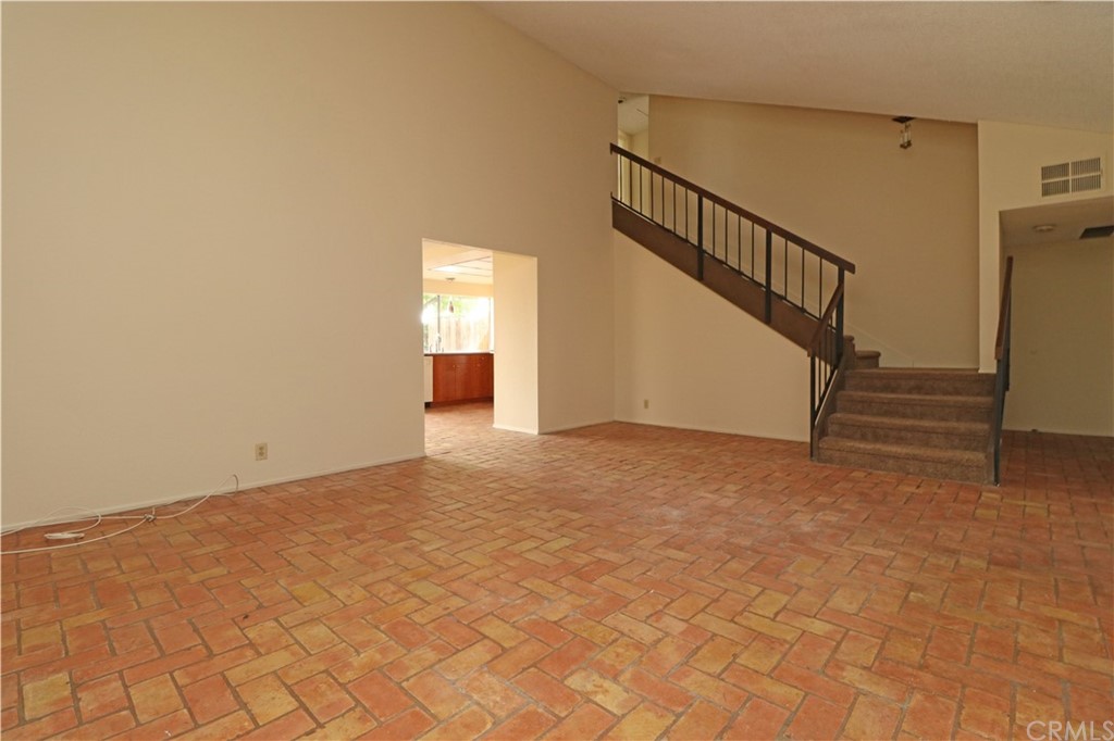 712 Earlham Drive Claremont, CA 91711 - Photo 4 of 14 a view of an empty room with stairs