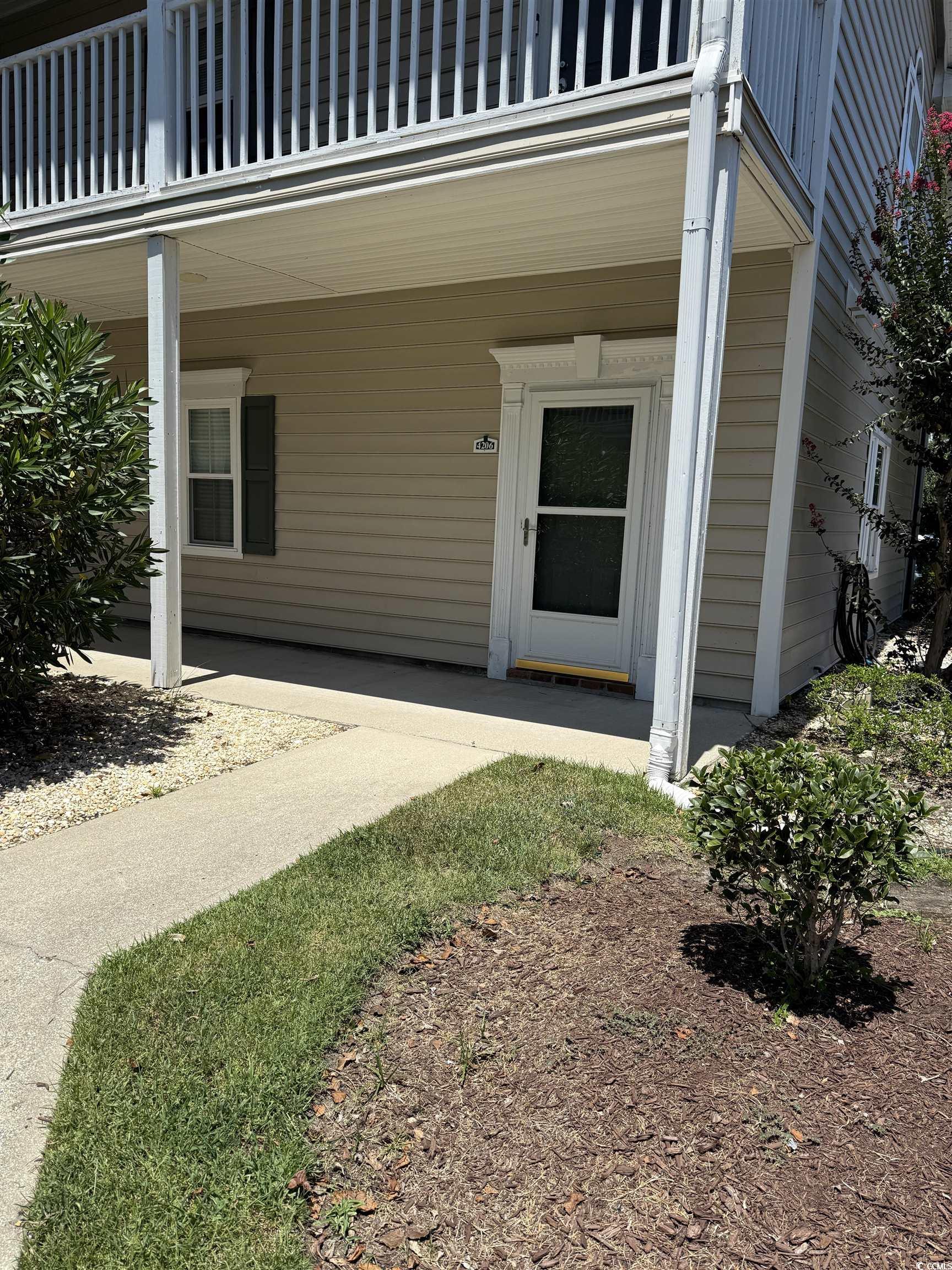 4206 Sweetwater Boulevard Murrells Inlet, SC 29576 - Photo 2 of 10 Property entrance with a balcony