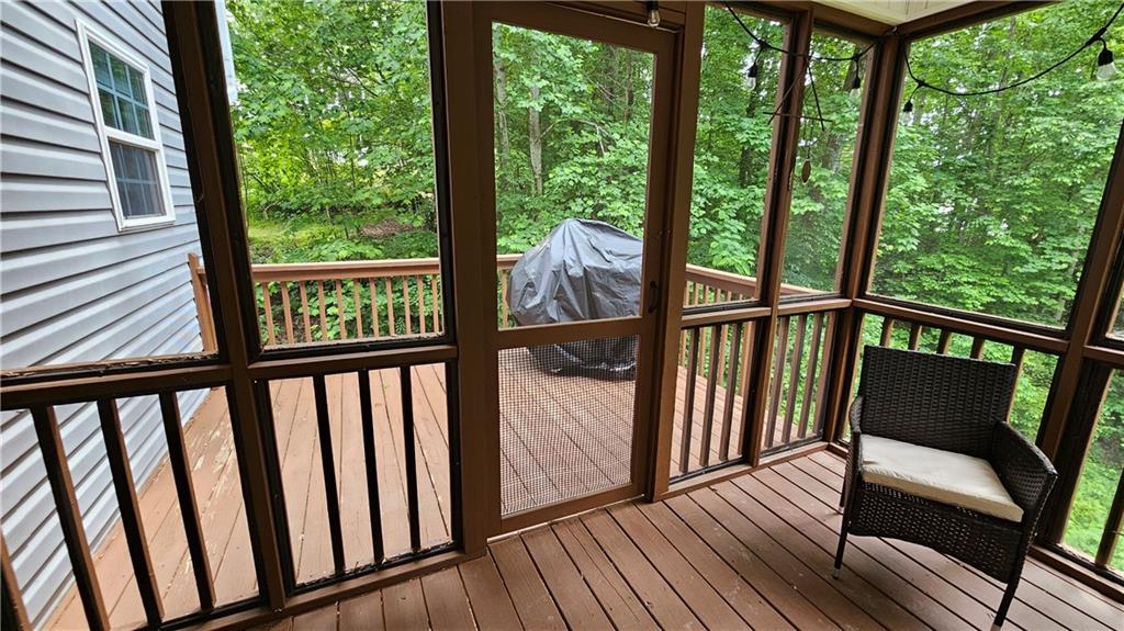 147 Oliver Drive Dallas, GA 30132 - Photo 19 of 55 a view of balcony with wooden floor