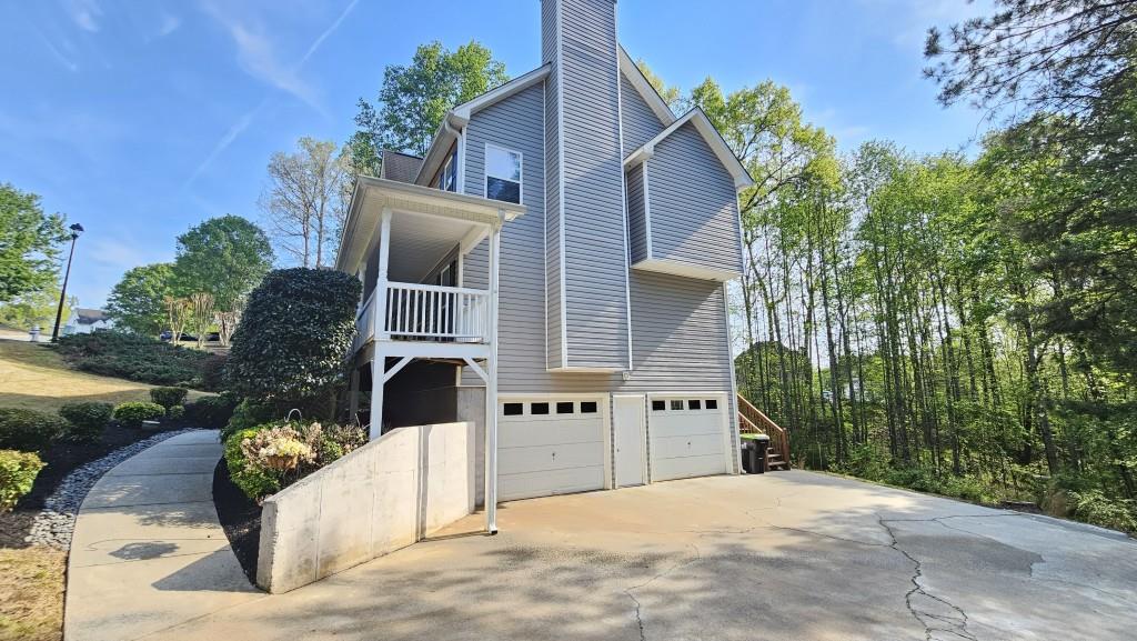 147 Oliver Drive Dallas, GA 30132 - Photo 3 of 55 front view of a house with a yard