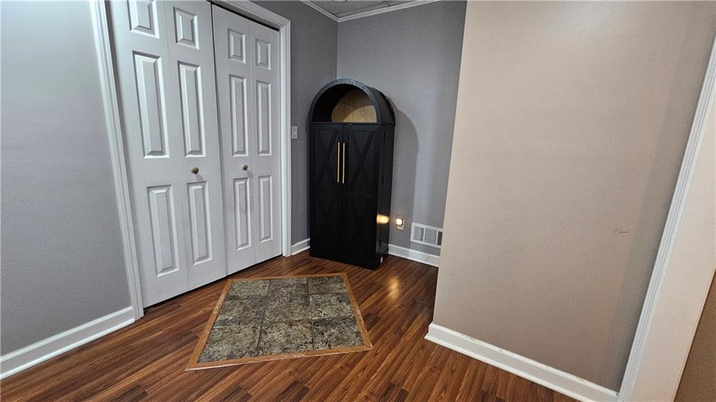 147 Oliver Drive Dallas, GA 30132 - Photo 44 of 55 a view of a hallway with wooden floor and closet