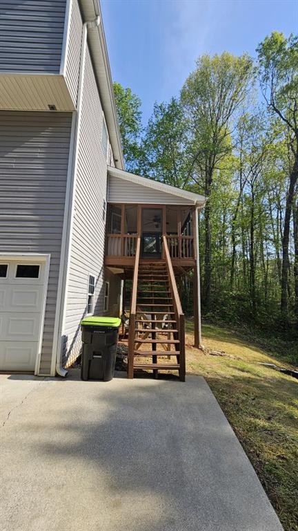 147 Oliver Drive Dallas, GA 30132 - Photo 49 of 55 a view of backyard with wooden stairs and a large tree