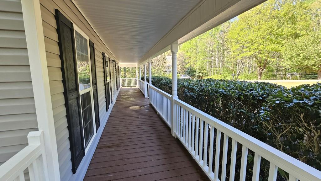 147 Oliver Drive Dallas, GA 30132 - Photo 5 of 55 a view of a balcony with wooden floor