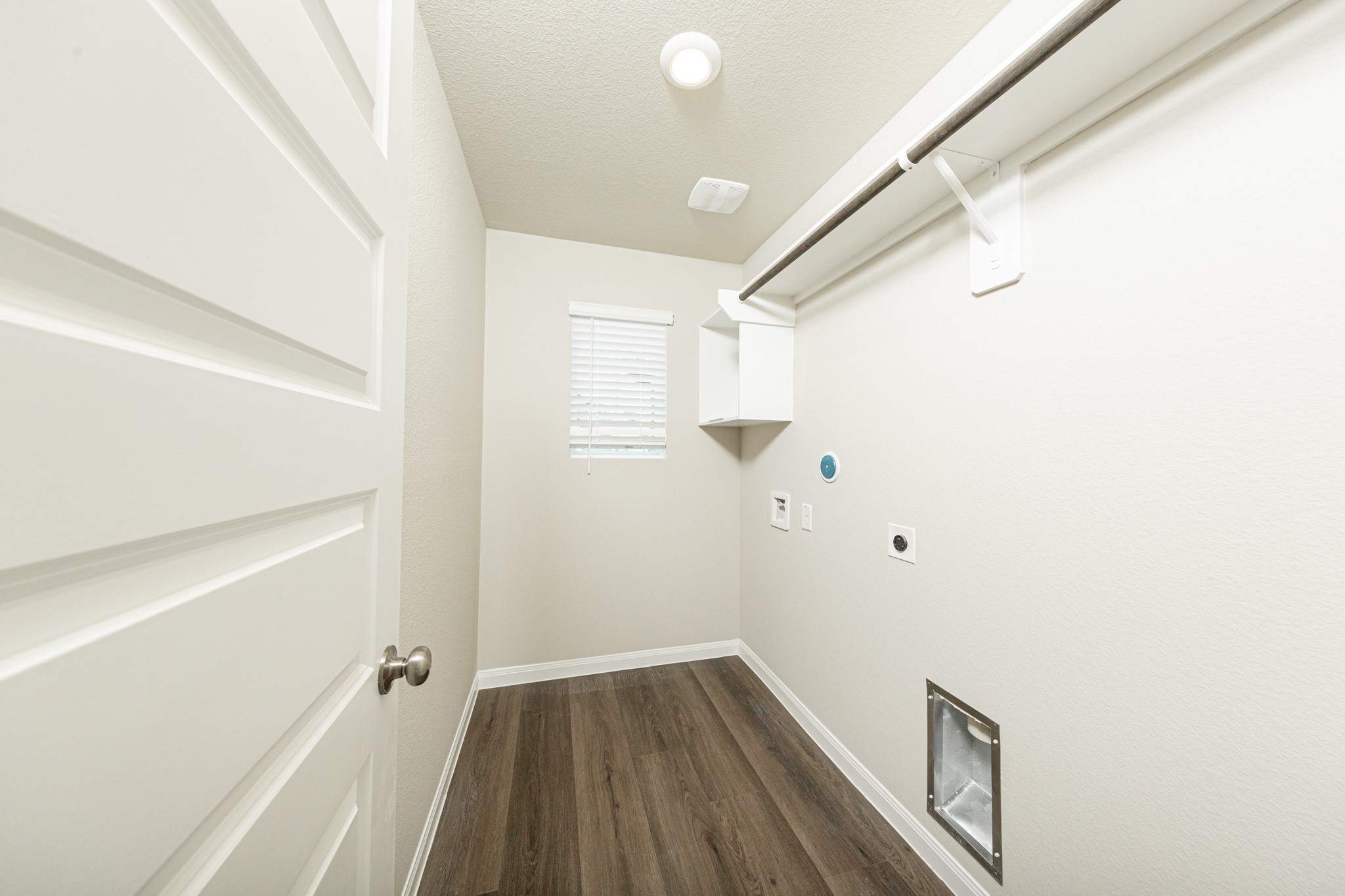 13654 Kit Run Splendora, TX 77372 - Photo 15 of 24 a view of a room with wooden floor and white walls