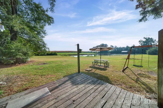 a view of a lake with a big yard