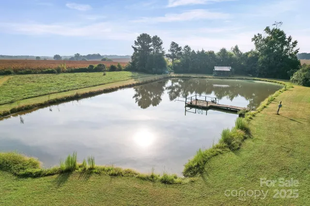 a view of a lake with a big yard