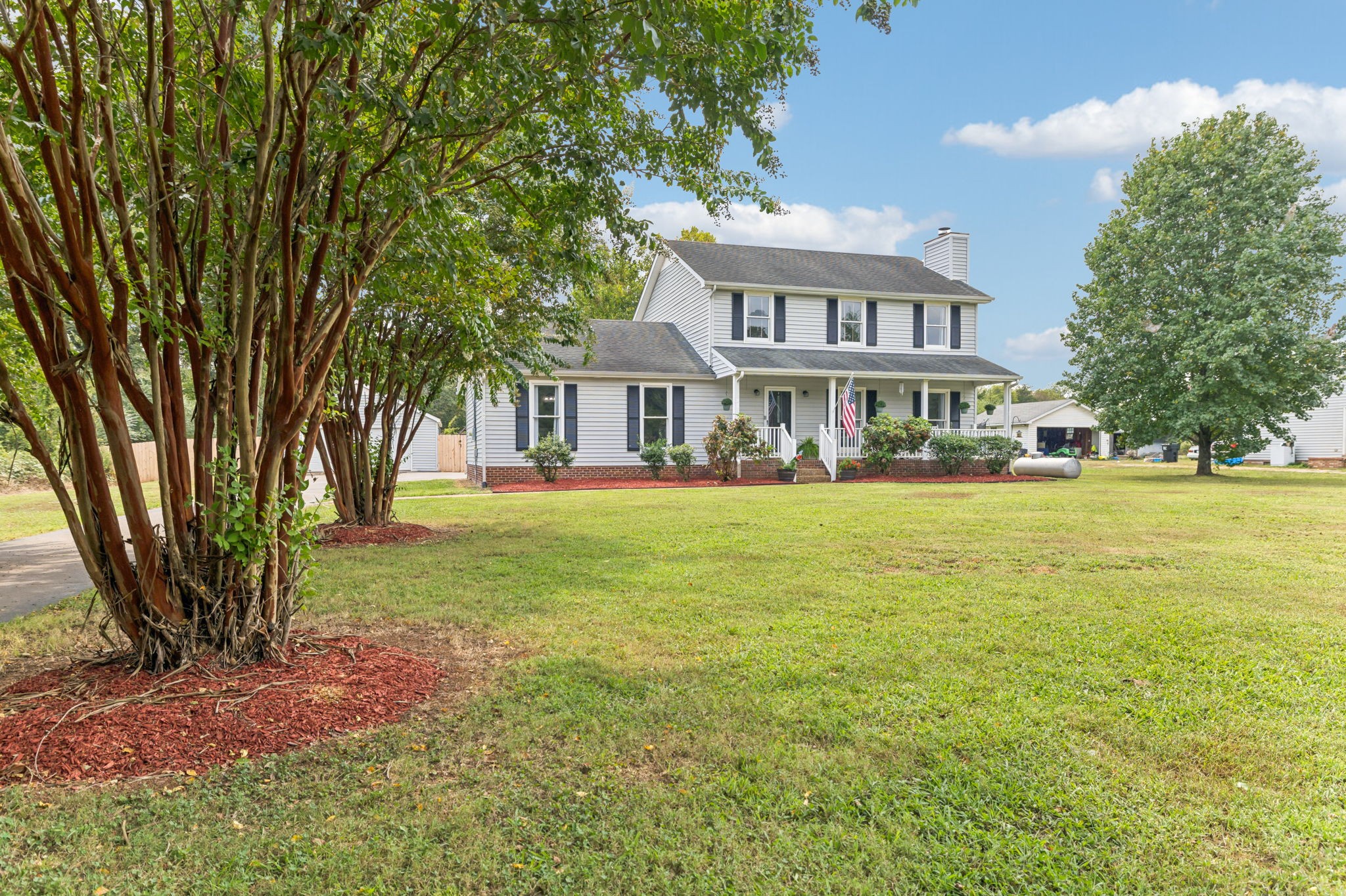 4011 Central Valley Road Murfreesboro, TN 37129 - Photo 27 of 43 a front view of a house with a yard