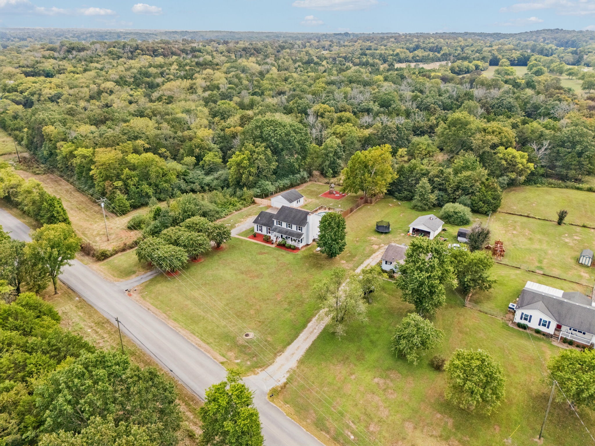 4011 Central Valley Road Murfreesboro, TN 37129 - Photo 4 of 43 an aerial view of residential houses with outdoor space