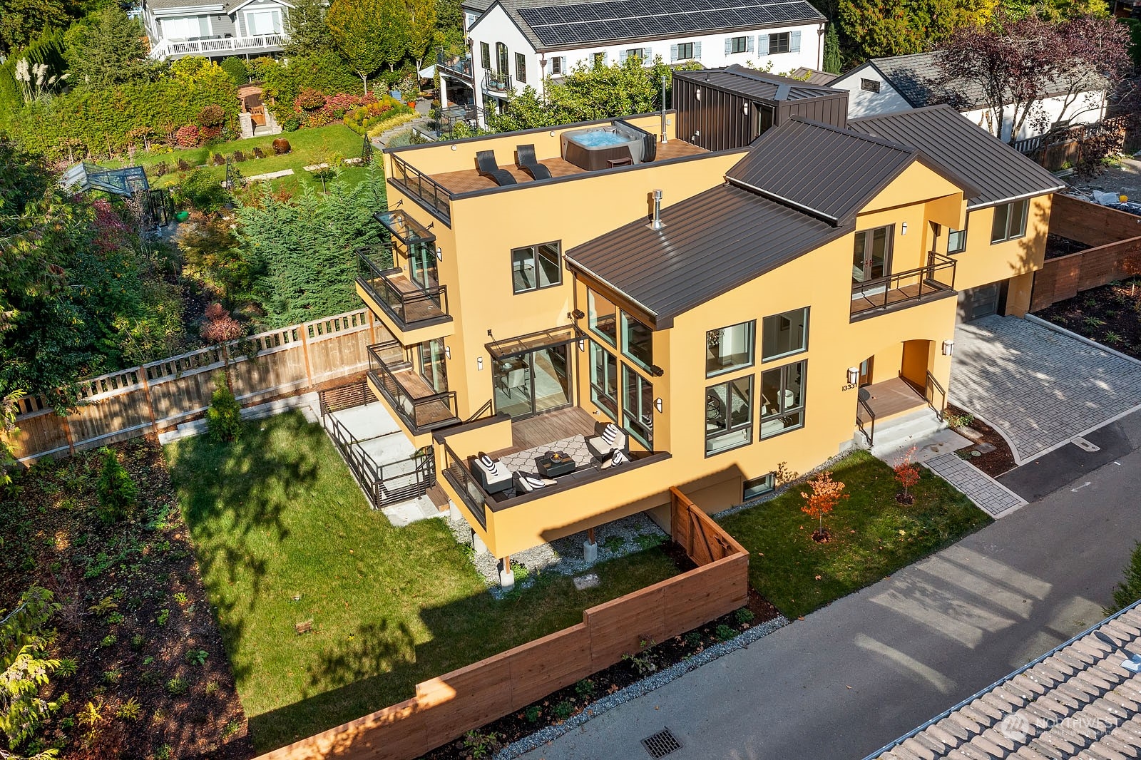 an aerial view of residential house with outdoor space and street view