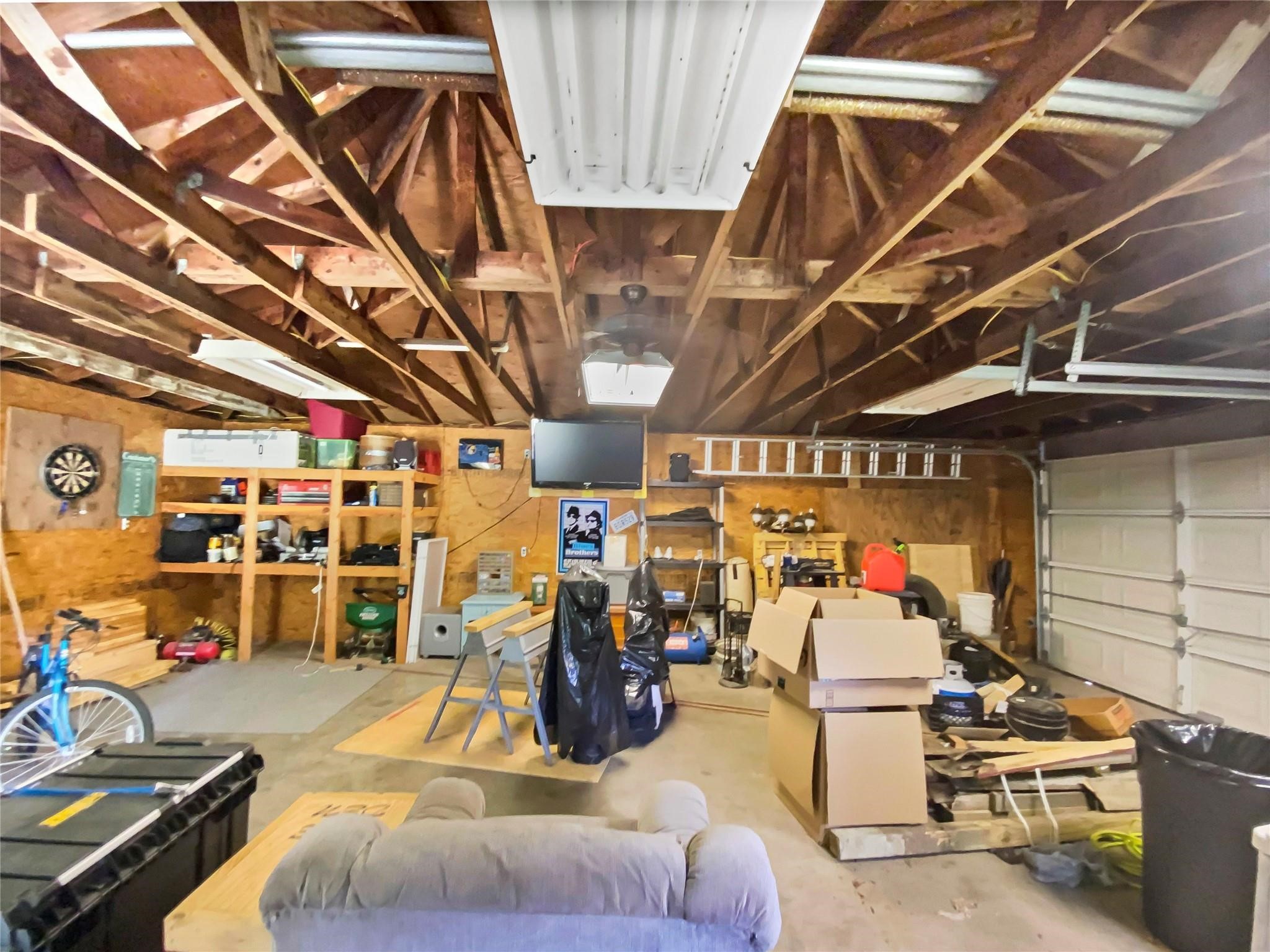 516 Dwyer Street Angleton, TX 77515 - Photo 18 of 18 a view of a room with gym equipment
