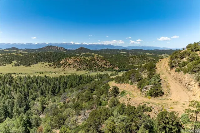 a view of a mountain with a lake