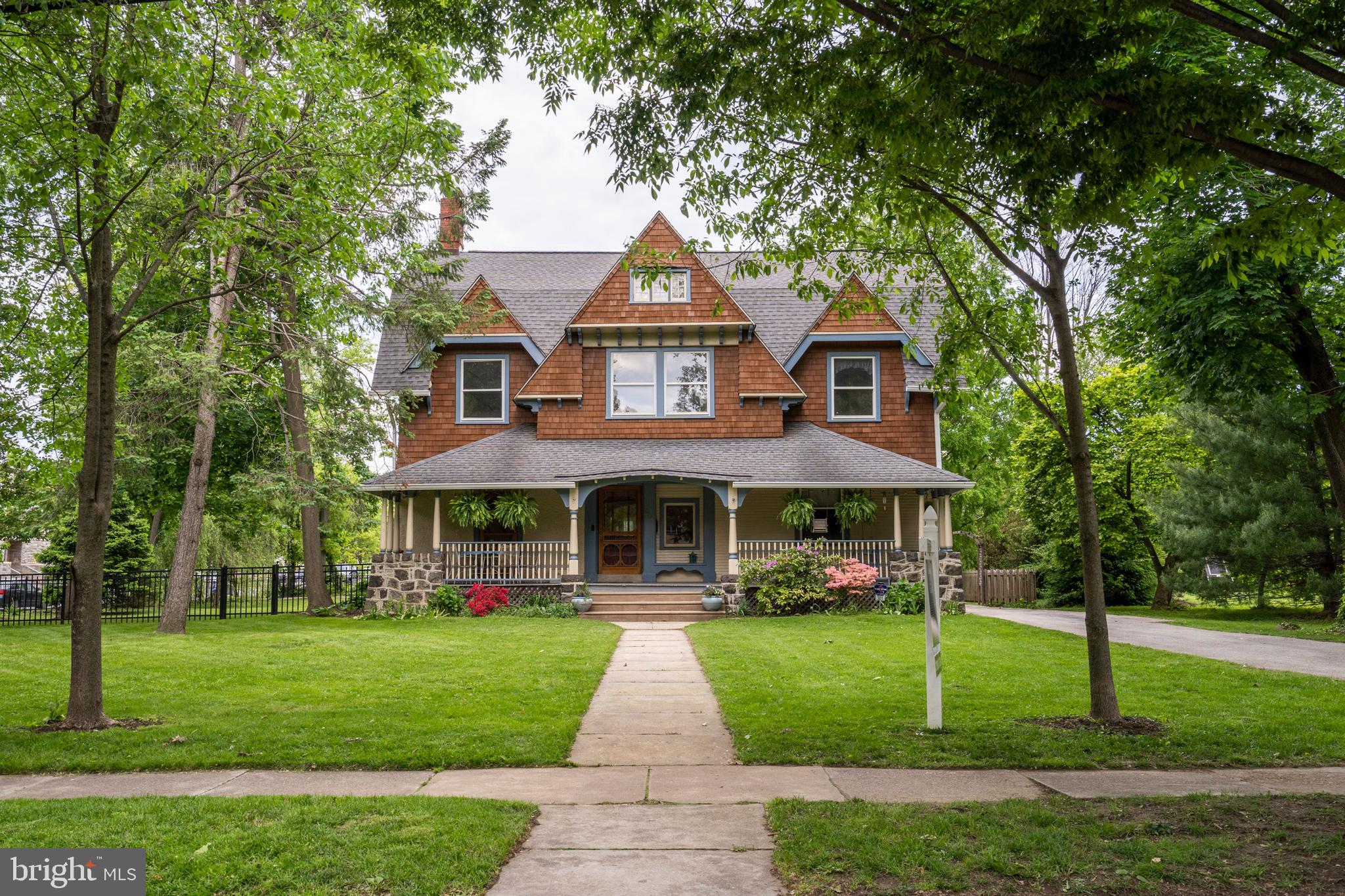 301 Midland Avenue Wayne, PA 19087 - Photo 2 of 63 a front view of a house with a yard