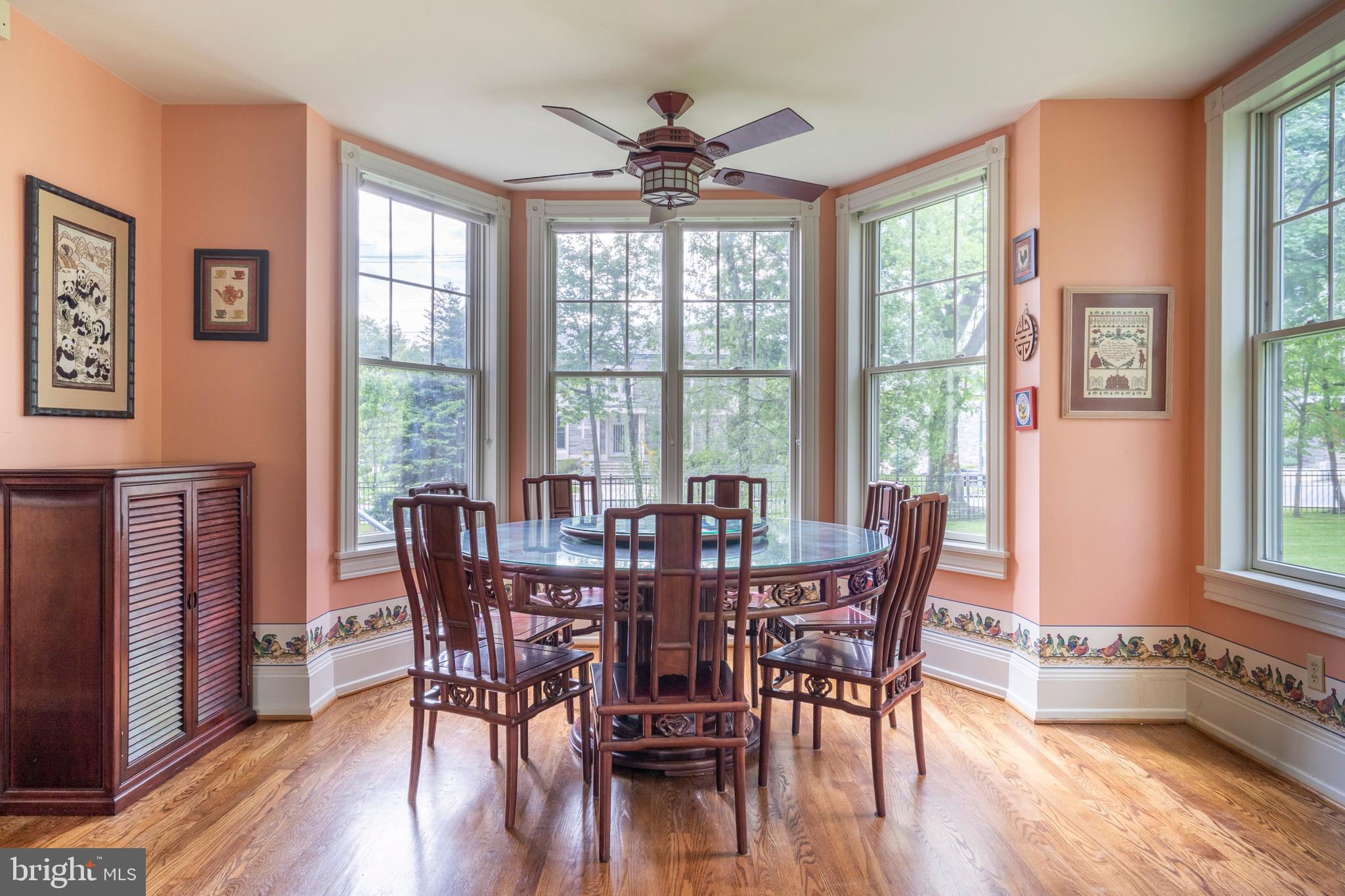 301 Midland Avenue Wayne, PA 19087 - Photo 17 of 63 a view of a dining room with furniture window and wooden floor