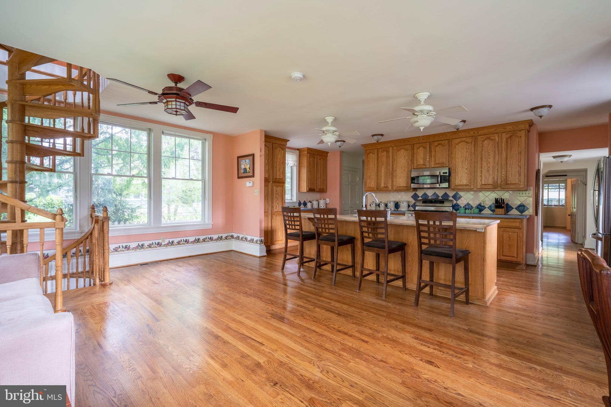 301 Midland Avenue Wayne, PA 19087 - Photo 20 of 63 a view of a dining room with furniture window and wooden floor