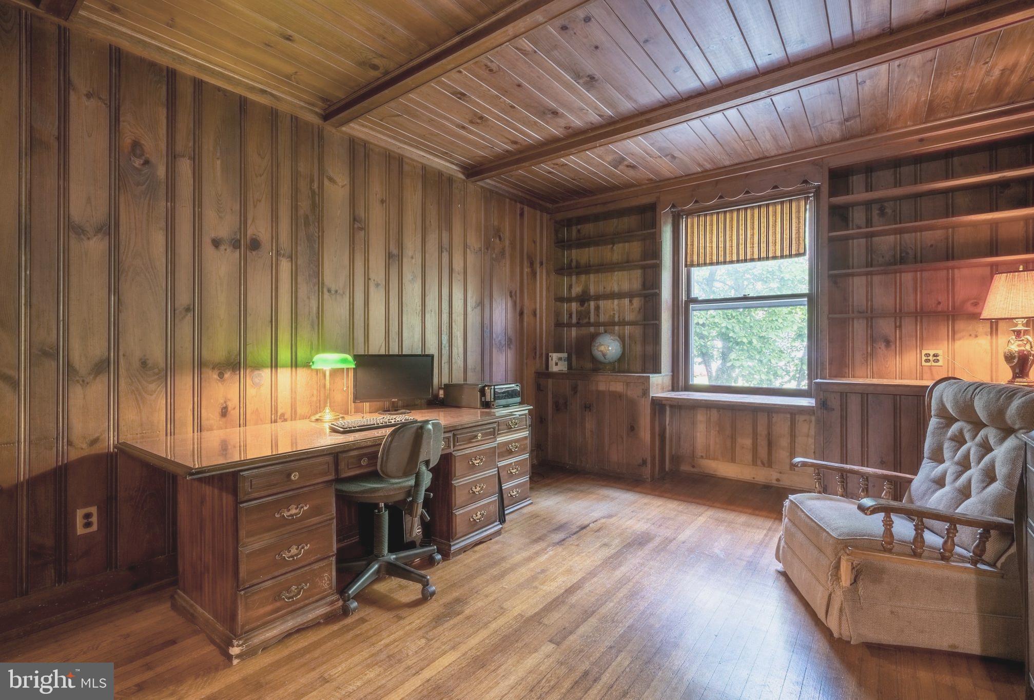 301 Midland Avenue Wayne, PA 19087 - Photo 22 of 63 a livingroom with workspace and a window