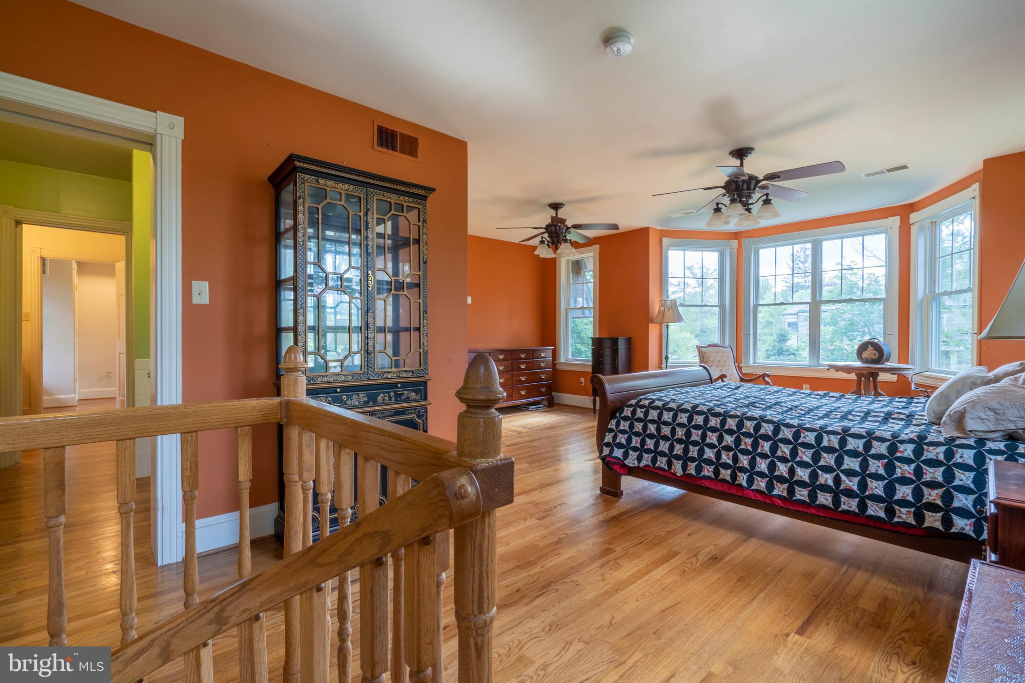 301 Midland Avenue Wayne, PA 19087 - Photo 26 of 63 a living room with furniture floor to ceiling window and a chandelier