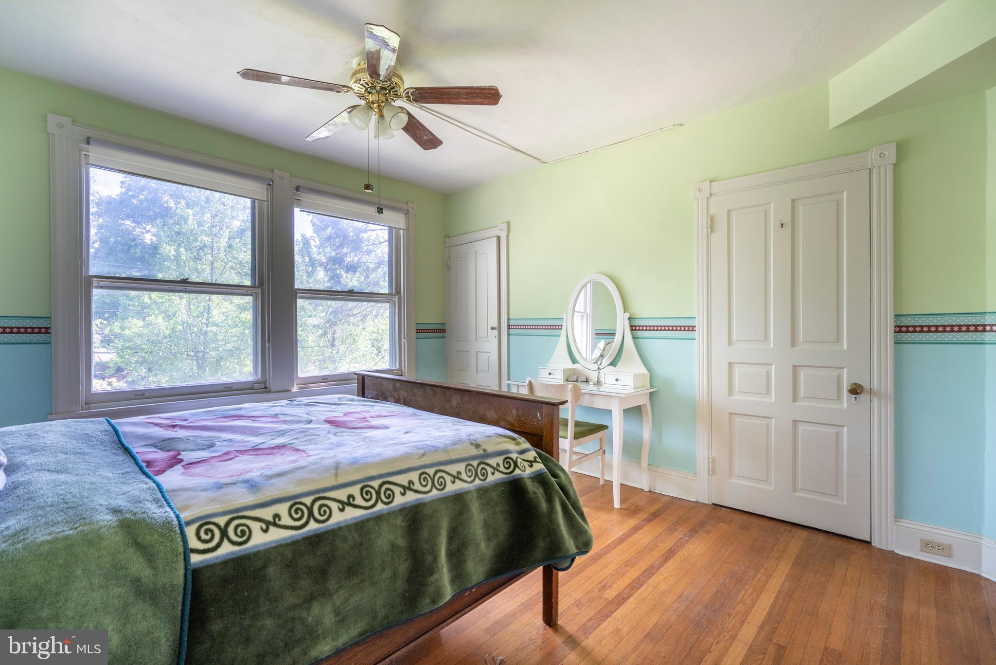 301 Midland Avenue Wayne, PA 19087 - Photo 33 of 63 a bed sitting in a bedroom next to a window