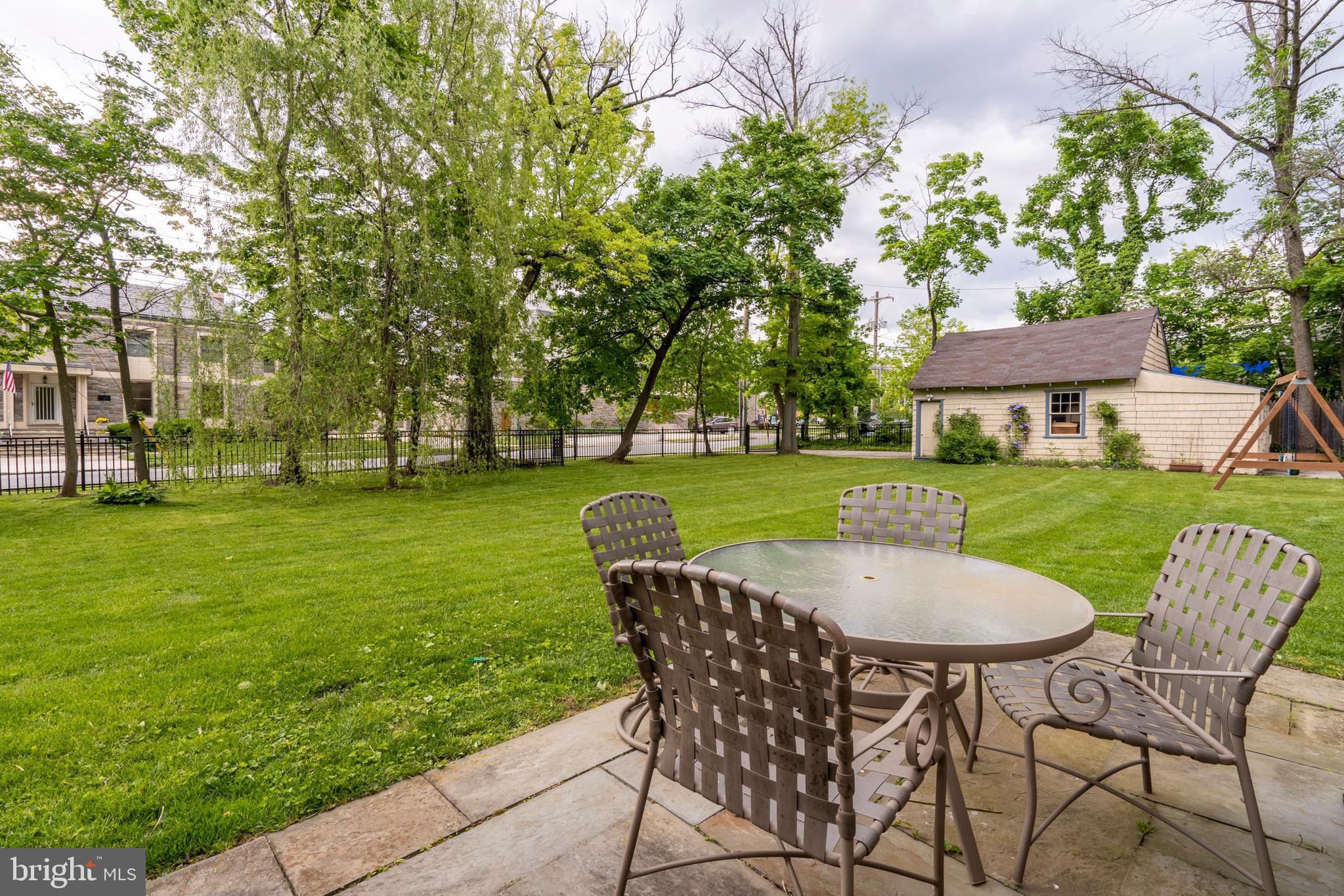 301 Midland Avenue Wayne, PA 19087 - Photo 51 of 63 a view of a house with a yard