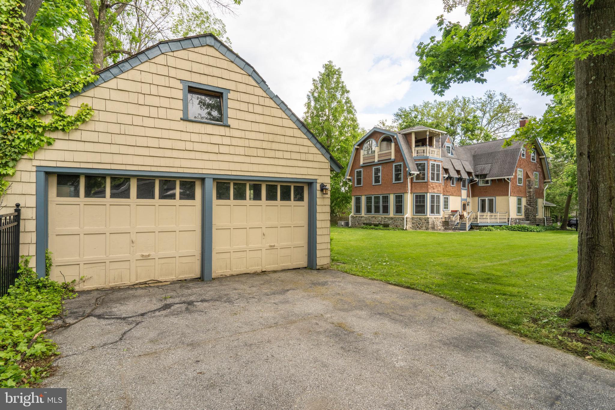 301 Midland Avenue Wayne, PA 19087 - Photo 55 of 63 a view of a house with a yard