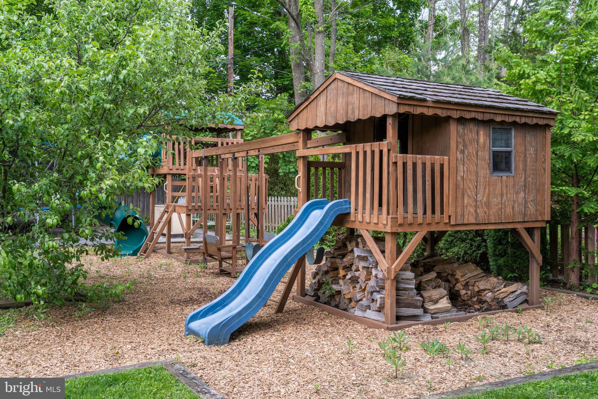 301 Midland Avenue Wayne, PA 19087 - Photo 58 of 63 a house that has a tree in it