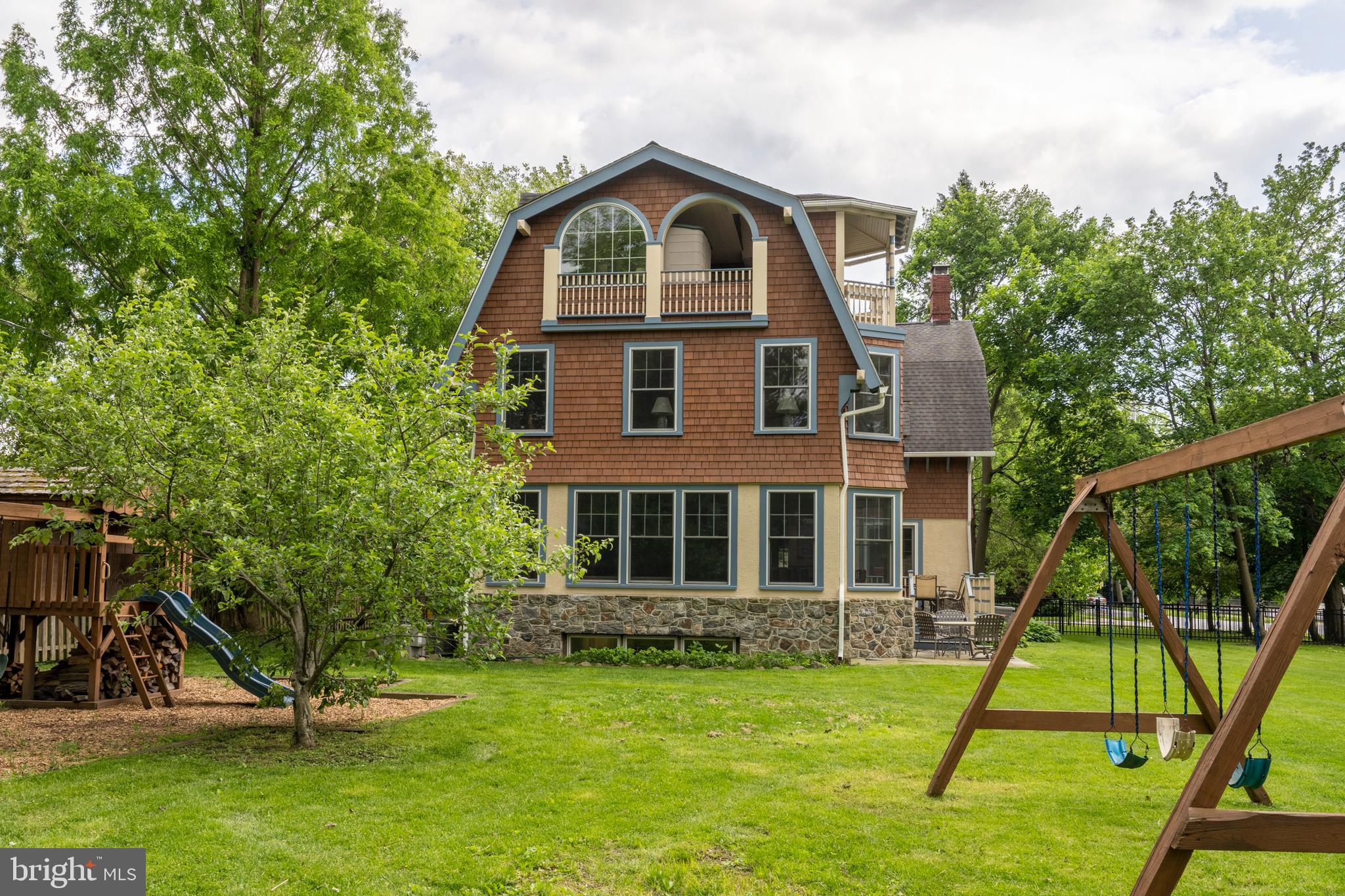 301 Midland Avenue Wayne, PA 19087 - Photo 60 of 63 a front view of a house with a yard