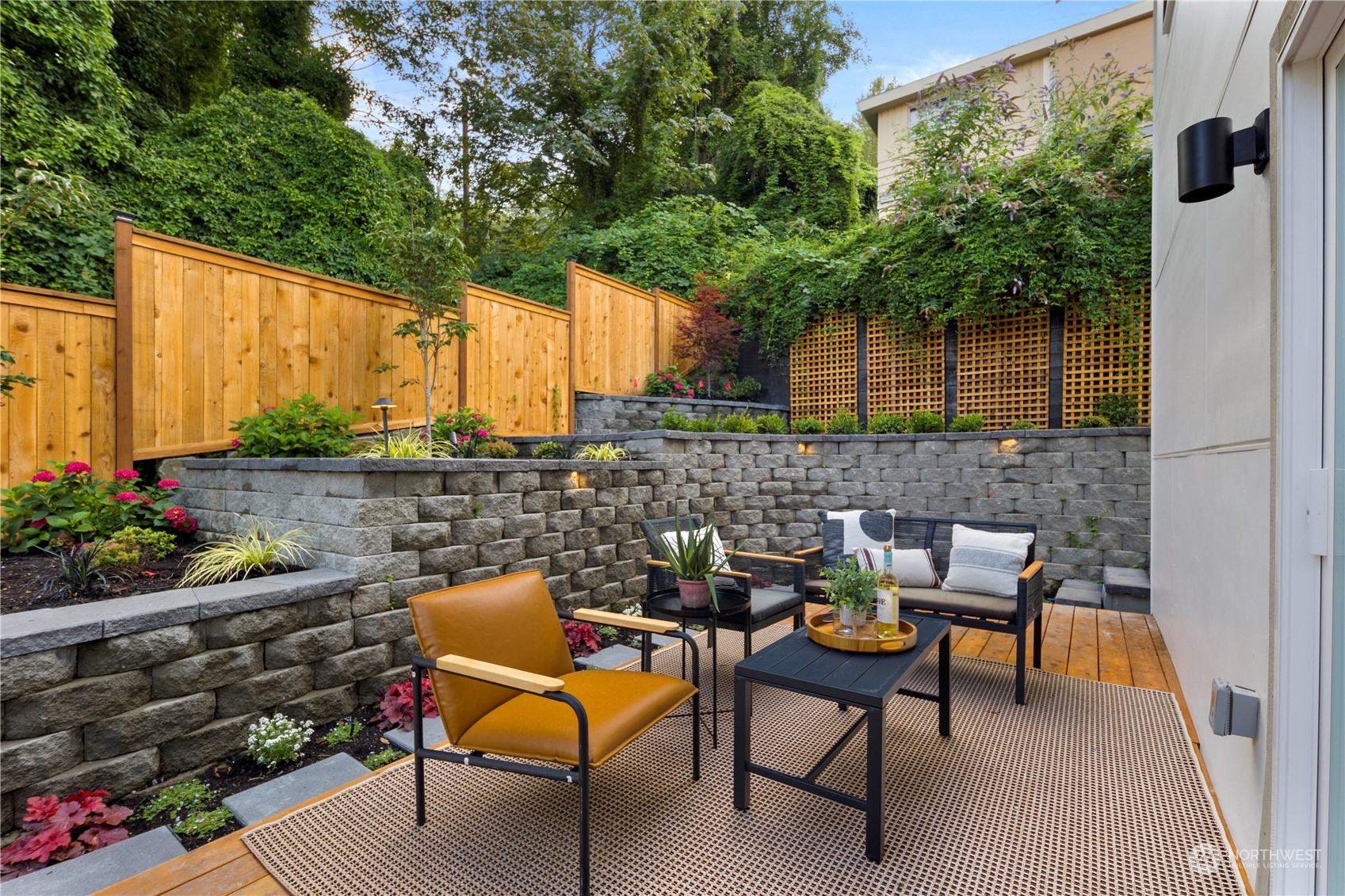 3303 31st Avenue Southwest, Unit B Seattle, WA 98126 - Photo 18 of 26 a view of a chairs and table in the patio
