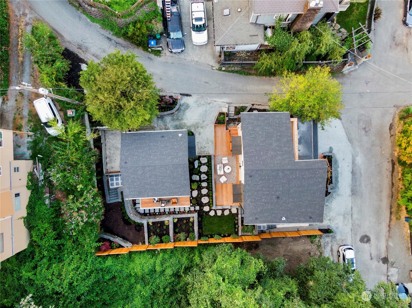 3303 31st Avenue Southwest, Unit B Seattle, WA 98126 - Photo 25 of 26 an aerial view of a house with a garden and trees