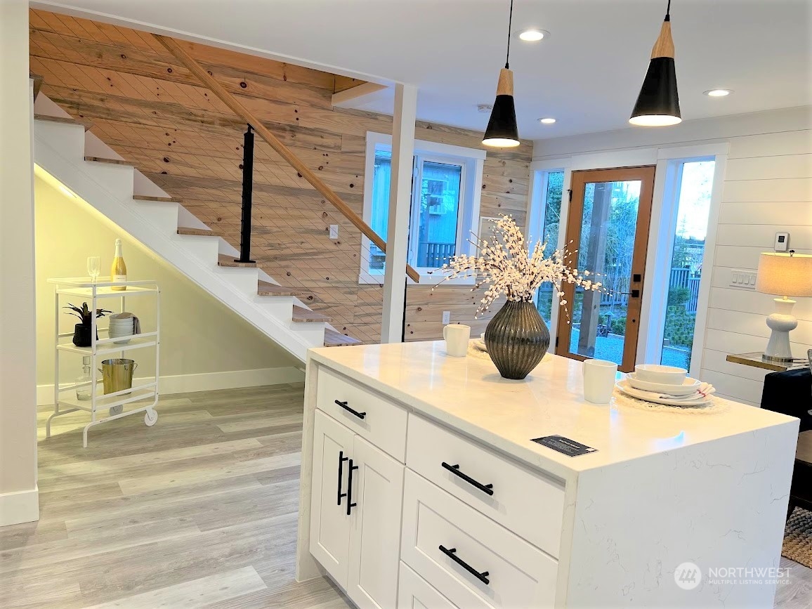 3303 31st Avenue Southwest, Unit B Seattle, WA 98126 - Photo 10 of 26 a kitchen view with table and chairs