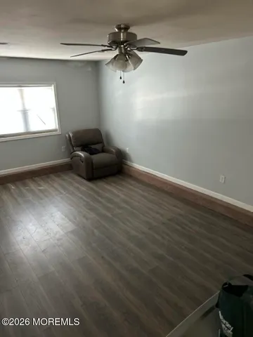 a view of a livingroom with a window