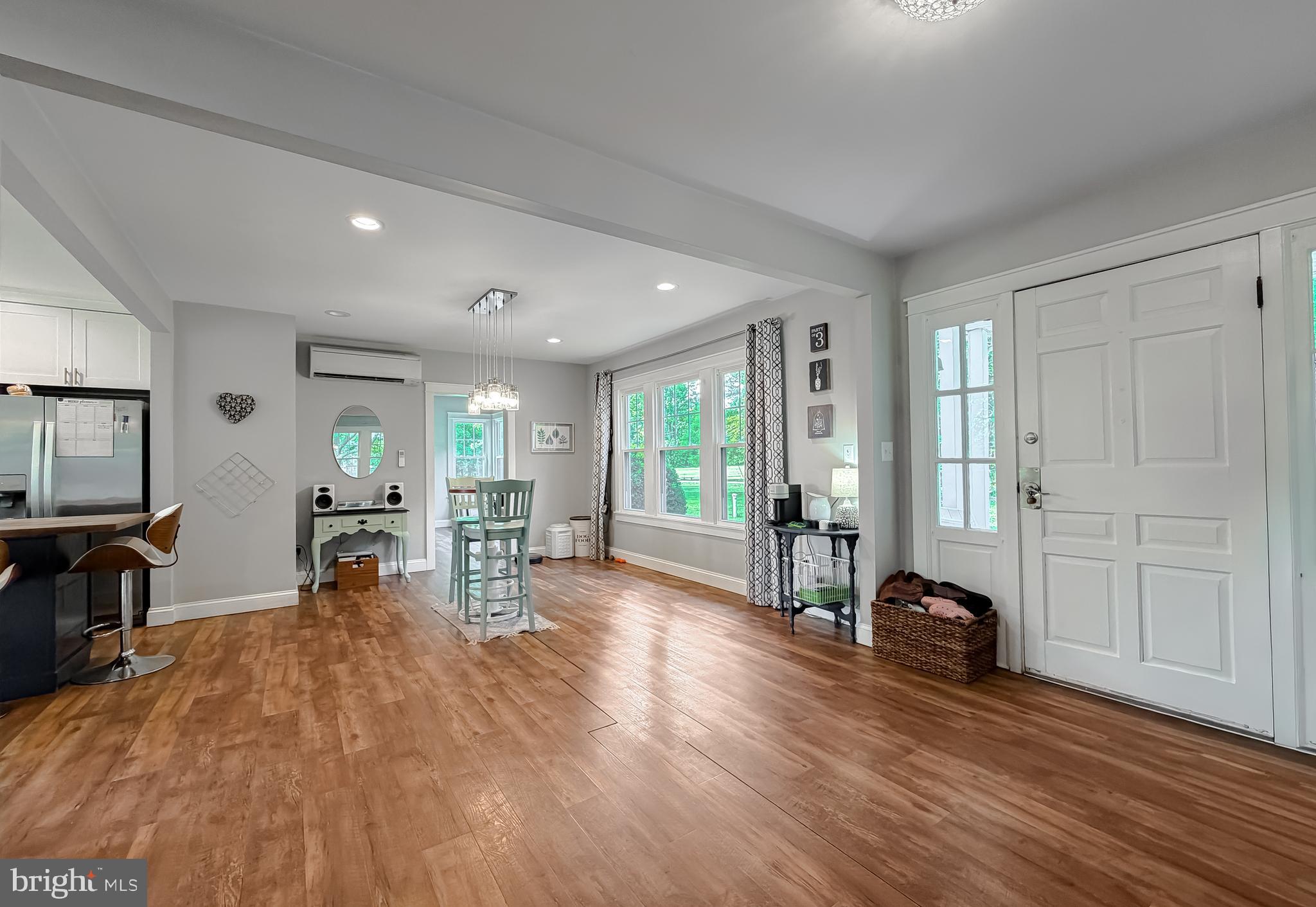 16146 Thomas Road Piney Point, MD 20674 - Photo 13 of 57 a living room with furniture and wooden floor